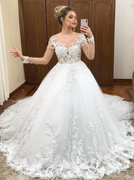 Luxurious Tulle A-line Wedding Gown with Cathedral Train and Illusion Neckline