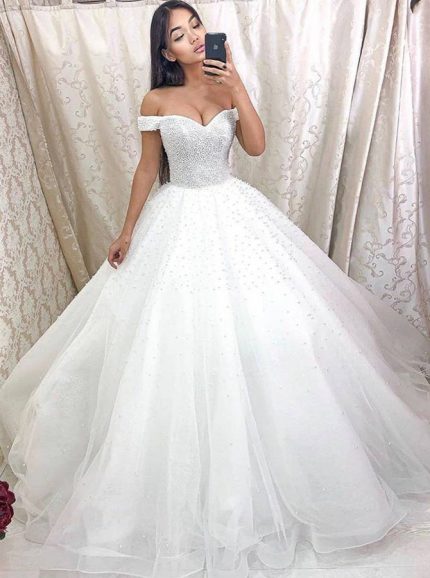 Luxurious Tulle A-line Wedding Gown with Off The Shoulder Neckline