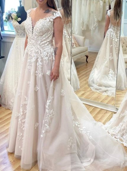 Elegant A-line Wedding Gown with Illusion Neckline and Lace Appliques