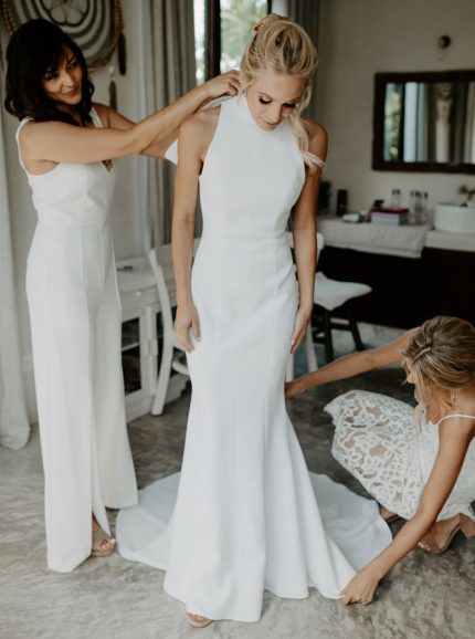 Modern High Neck Sleeveless Wedding Gown with Knot Embellishments