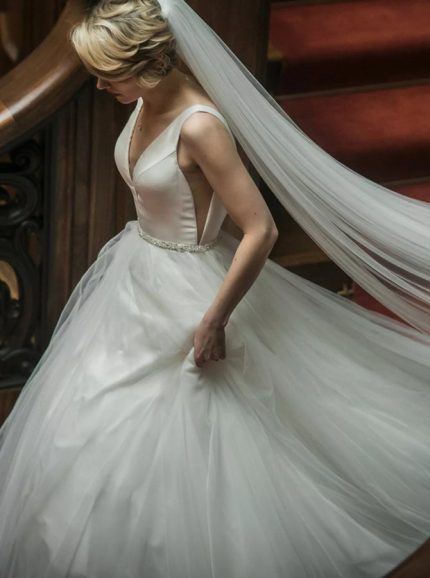 Elegant A-line Wedding Gown with Plunging Neckline and Jewelry Belt